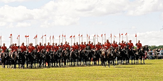 Royal Canadian Mounted Police.  In line Traditional charge.